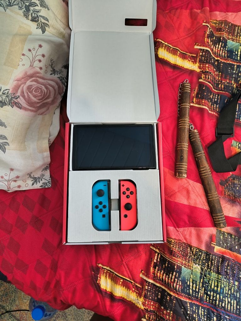 Nintendo switch oled-използвана е 9 месеца