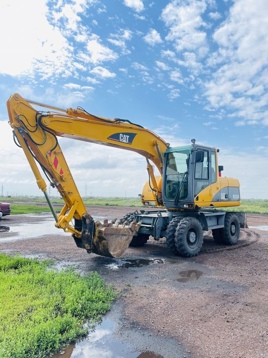 Услуги колесных экскаваторов и гидрамолота