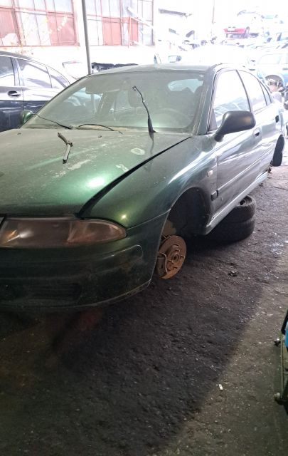 Lampa / Tripla stop dreapta pe aripa Mitsubishi Carisma prima generat