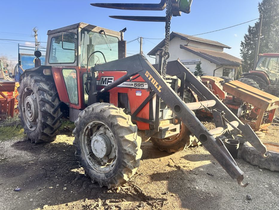 Dezmembrez Massey Ferguson 595
