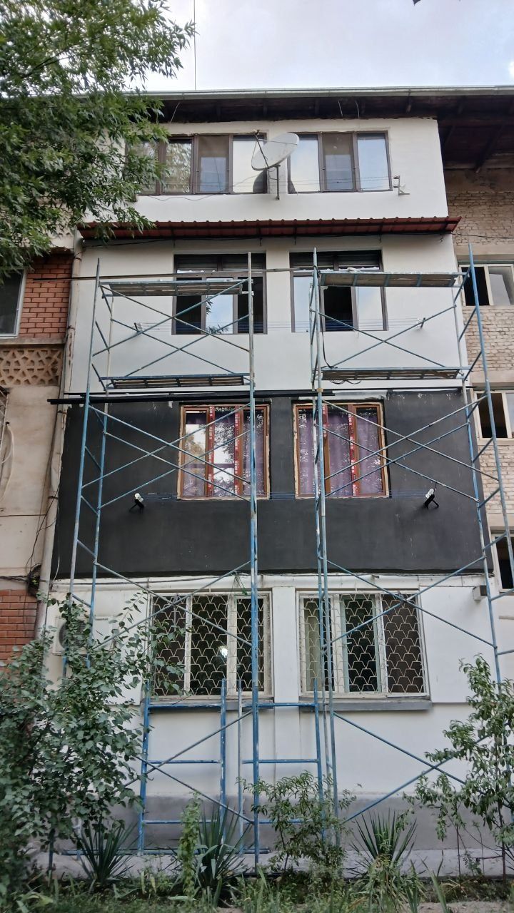 Утепление фасадов на высоте