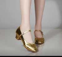 Новые золотистые туфли для танца