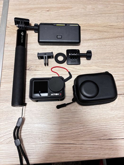 DJI Osmo Action 4  Adventure Combo  Stare impecabila