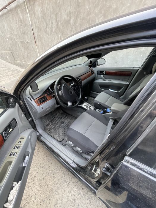 Lacetti 1.8 2010 yil qora 157.000 probeg