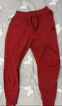 Pantaloni Nike Tech roșii