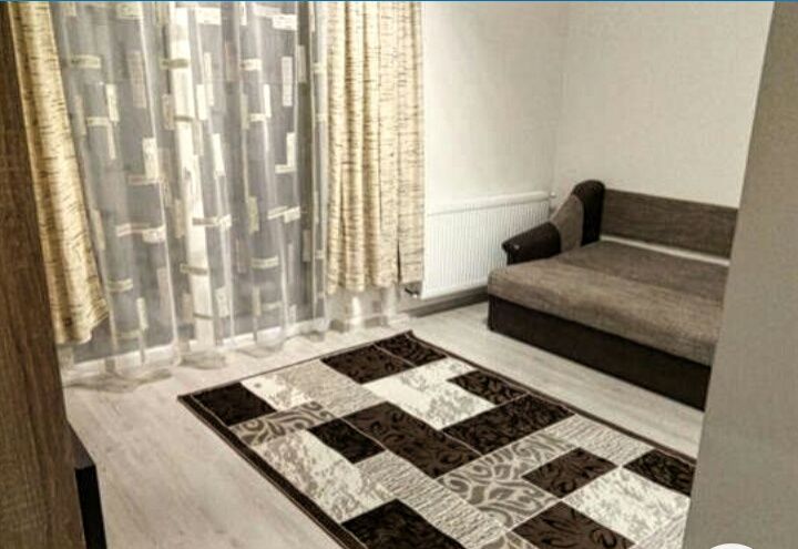 Proprietar închiriez apartament cu o cameră cu loc de parcare