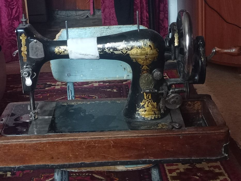 Швейная машинка Зингер