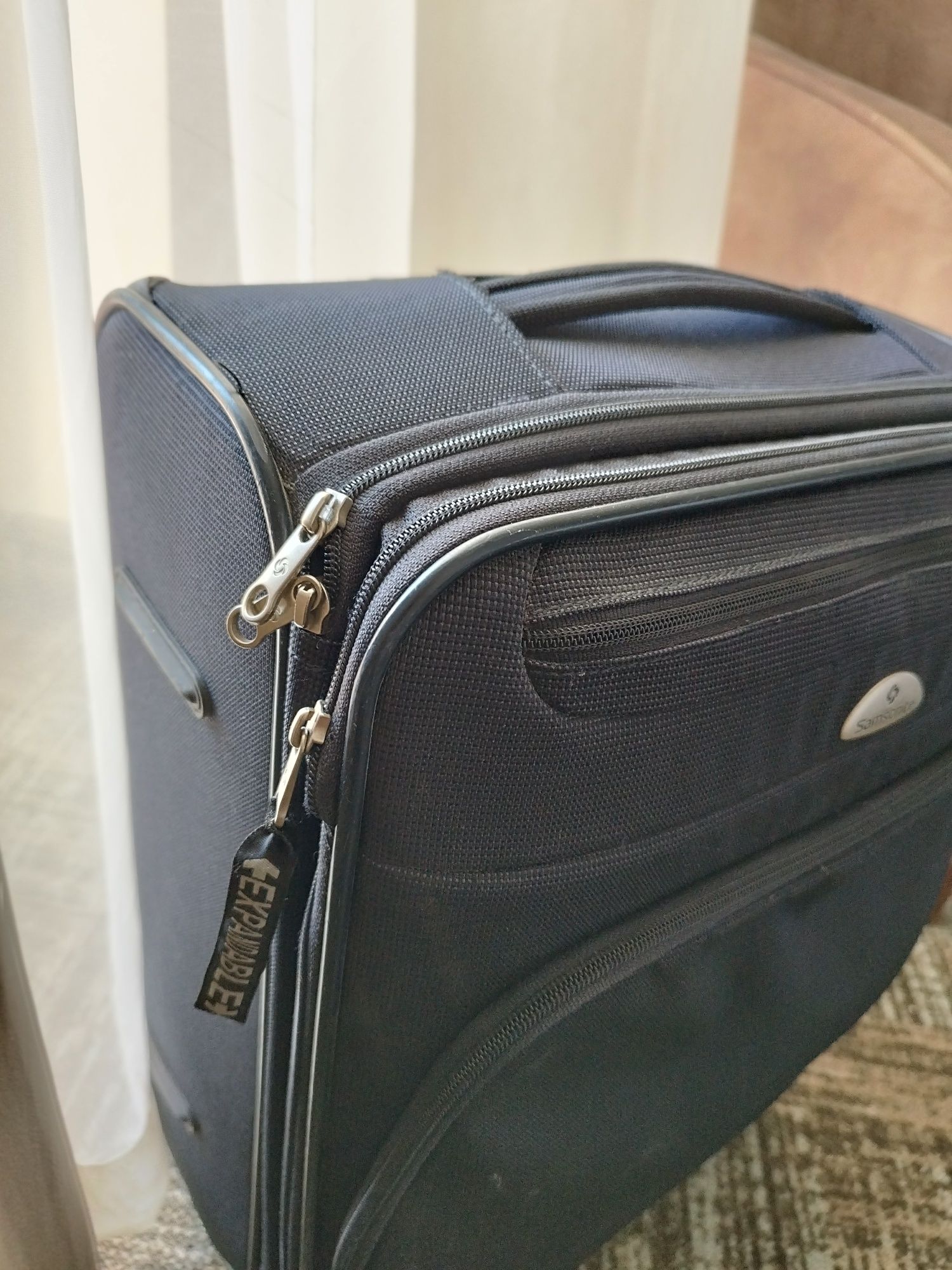 Samsonite син куфар 55 см.