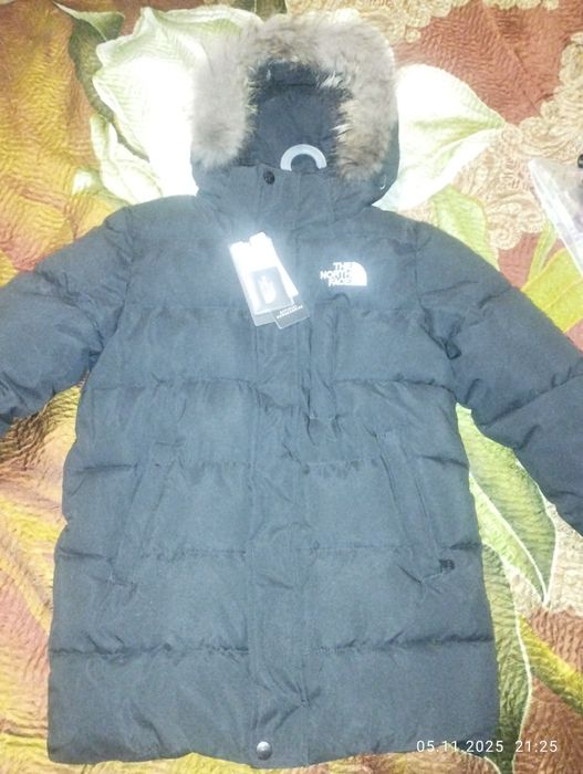 Новая зимняя куртка 152р