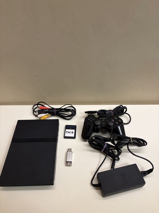 PS2 modat FMCB 32 jocuri