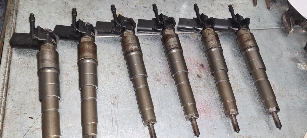 Injectoare injector BMW seria 5,e 60,e61,motor 3.0 diesel