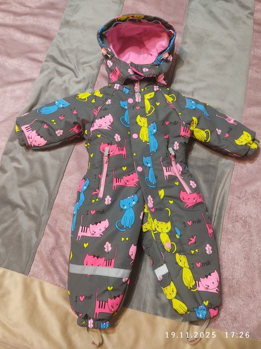 Новый комбинезон зимний.