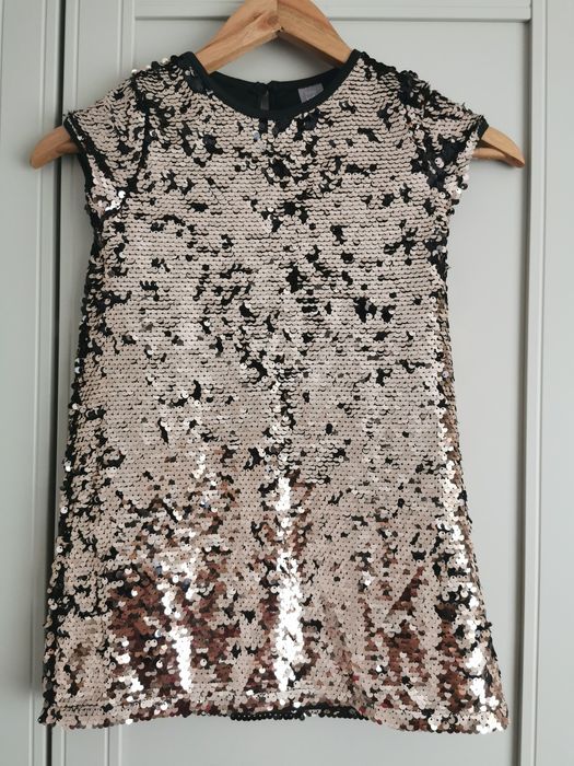 Rochita cu paiete reversibile, marime 110 (4-5 ani) 
Marime 11