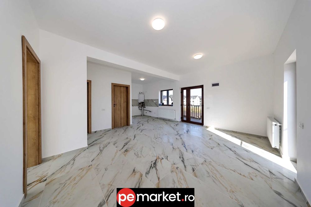 Casă multifamilială cu 2 apartamente + mansardă – Sânpetru, Brașov