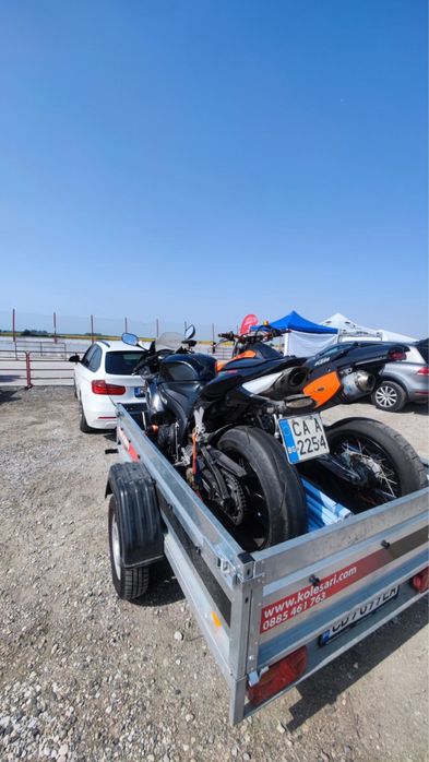 Ремаркета / платформи / колесари за превоз на мотори и АТВ под наем