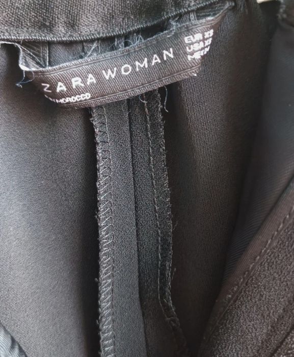 Pantaloni cu crac larg