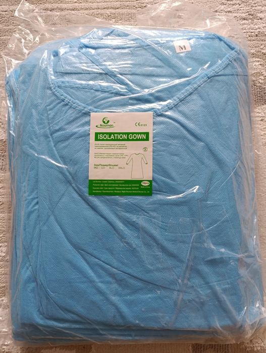 Продам одноразовые халаты.