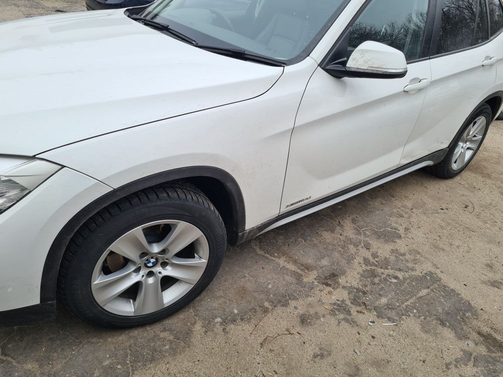 Usa fata spate bmw x1 e84 facelift