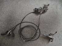 Set frane SHIMANO DEORE ( 4 pistoane și 2 pistoane )