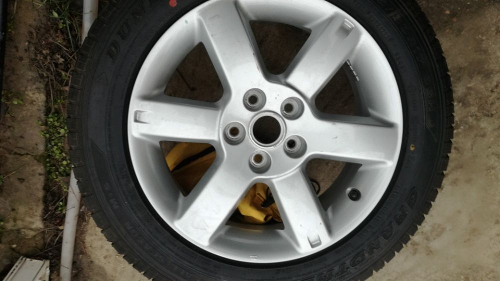 Janta aliaj +anvelopa aproape noua 7/5x114,3/17-215-60-17