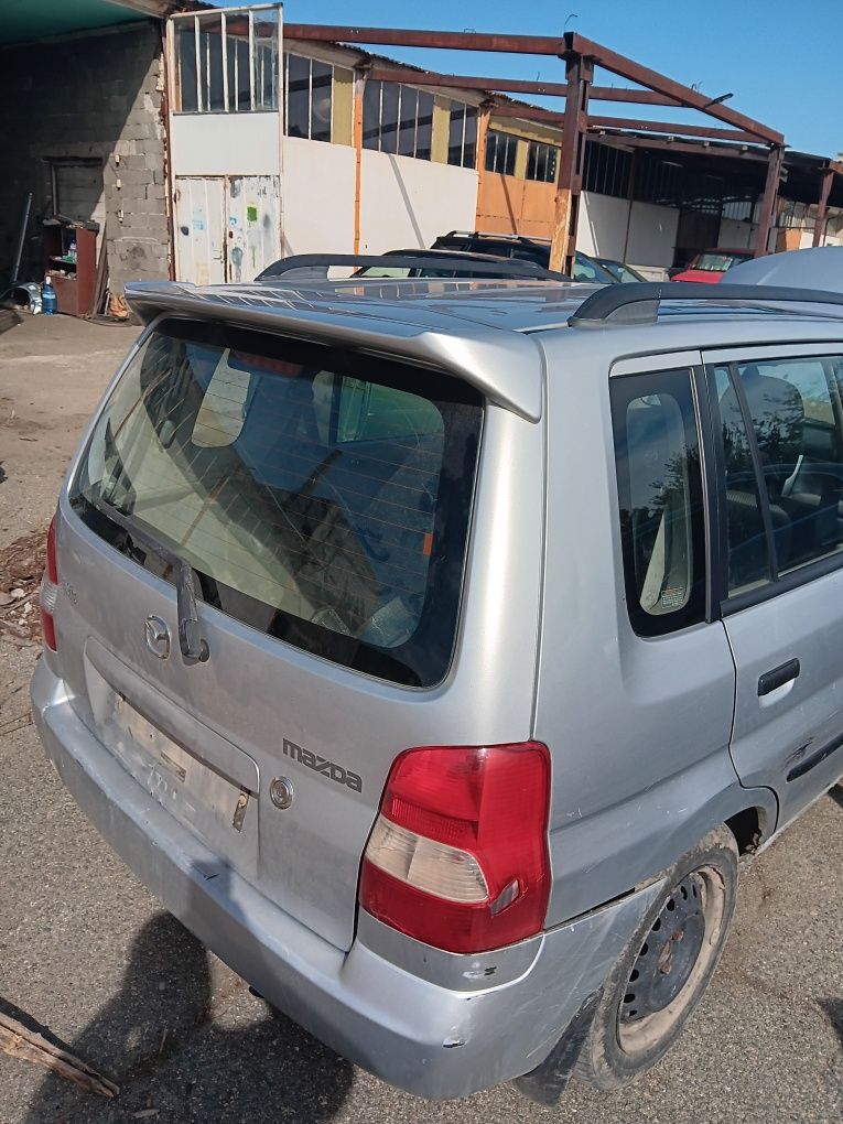 Mazda Demio 1,5 на части