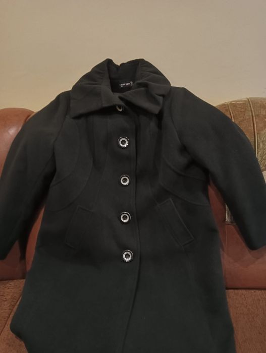 Palton negru, 52