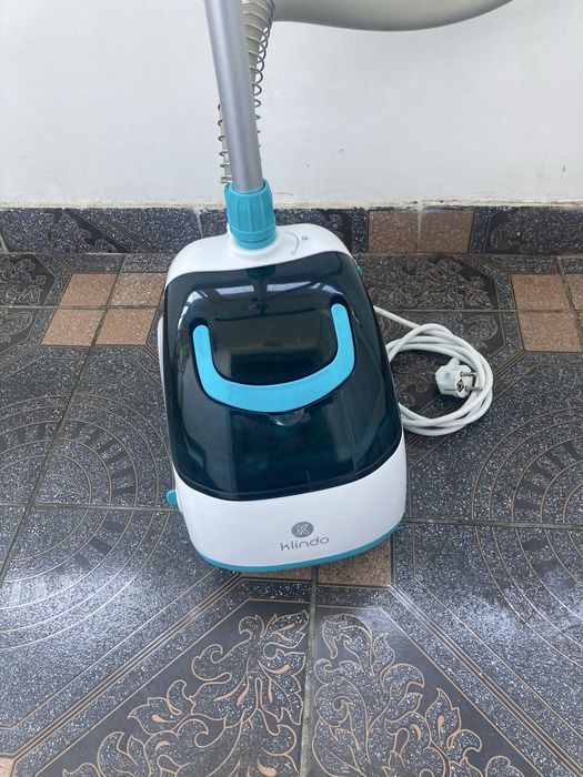 Aparat de calcat vertical cu abur