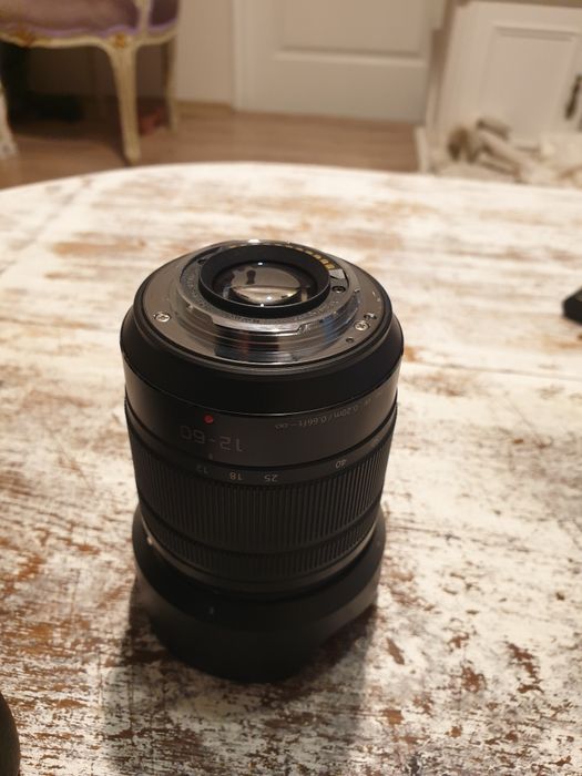 Panasonic 12-60 aproape ca nou
