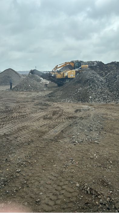 buldoexcavator basculante de inchiriat