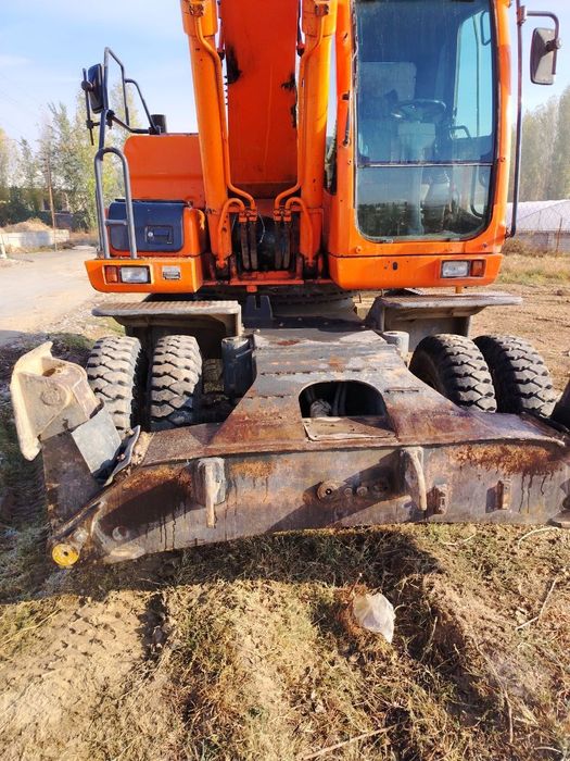 Доосан колёсный эксковатор 210 инжектор матор сотилади холати яхши