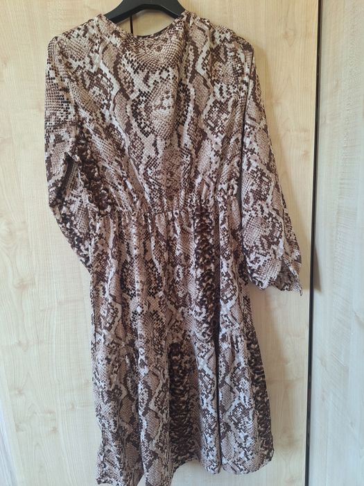 Актуална рокля със животински принт