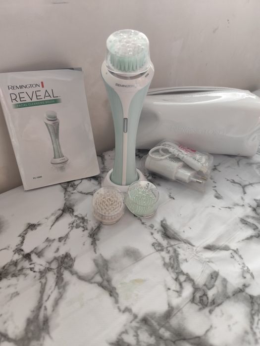 Уред за почистване на лице Remington