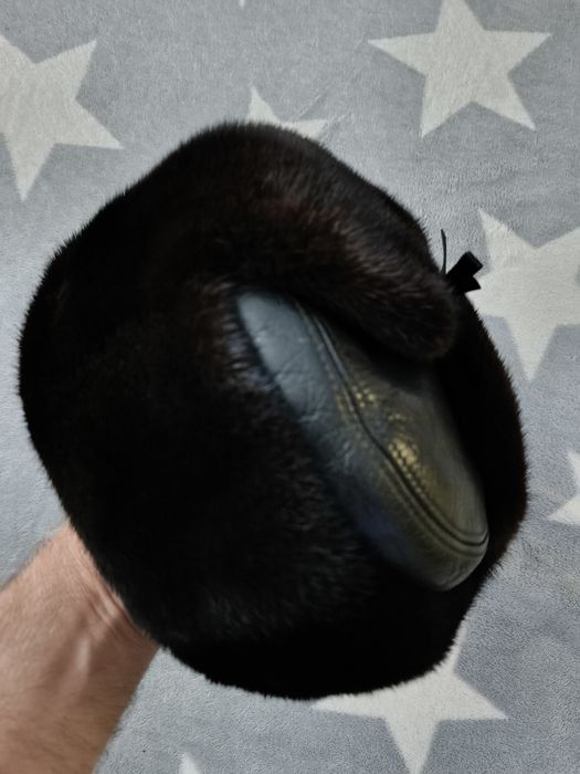 Продам новую куртку зимнюю и шапку