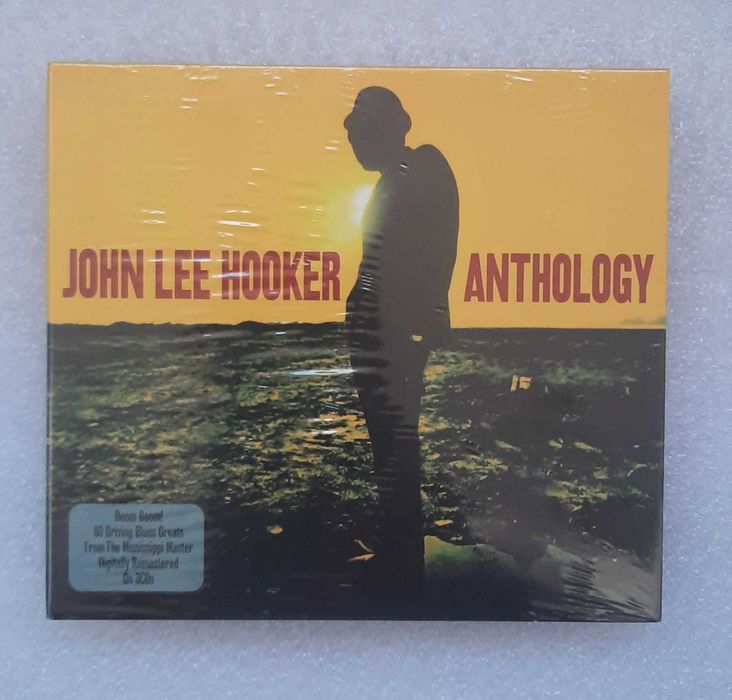 CD box Eagles-Status Quo-John Lee Hooker