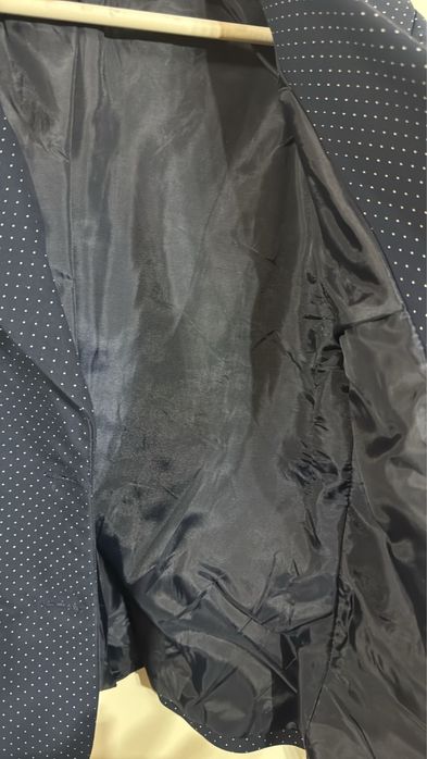 Costum Novatex nou fara eticheta