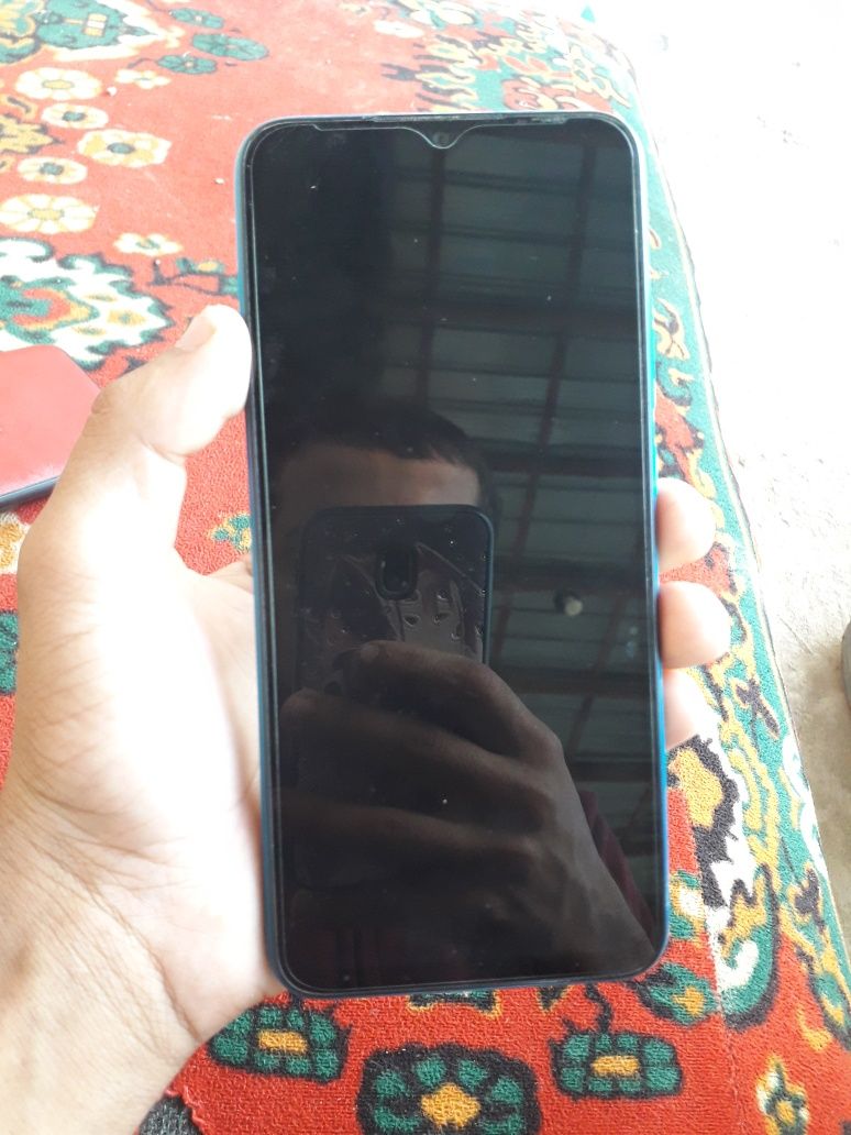 Xiomi Redmi 9A..