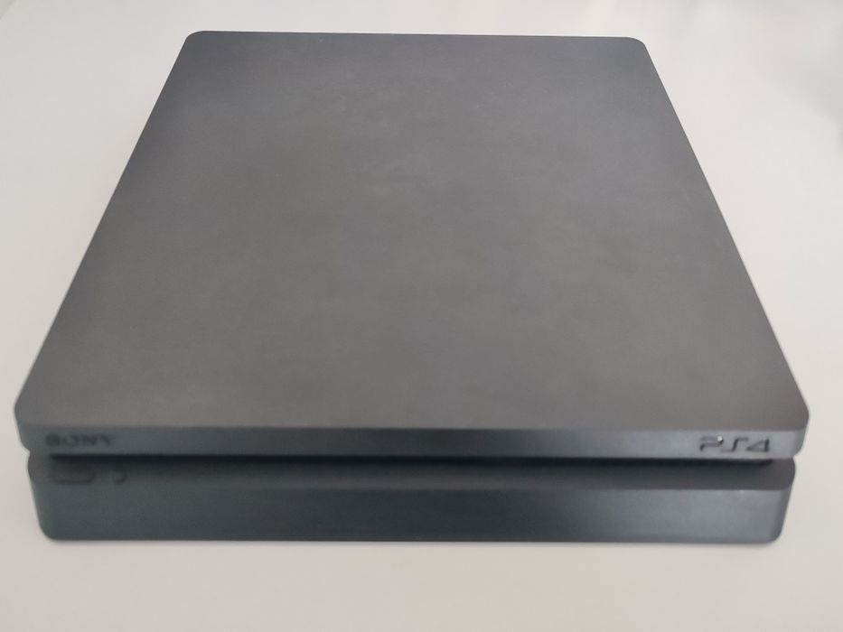 PlayStation 4 Slim – 1TB + 2 manete + 7 jocuri