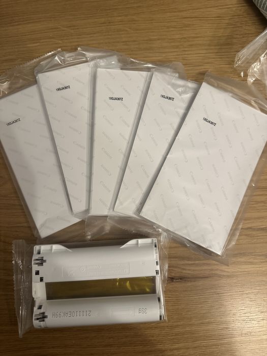 Imprimantă foto Canon SELPHY CP1500 + hârtie Canon RP-108