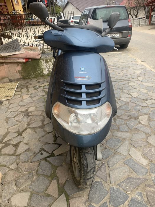 Scuter Piaggio 2 persoane  LX4 125cc 4t