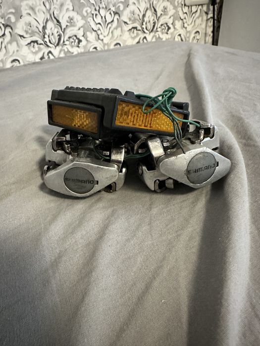 Pedale Shimano PD-M505 cu prindere SPD si adaptoare cu catadioptri