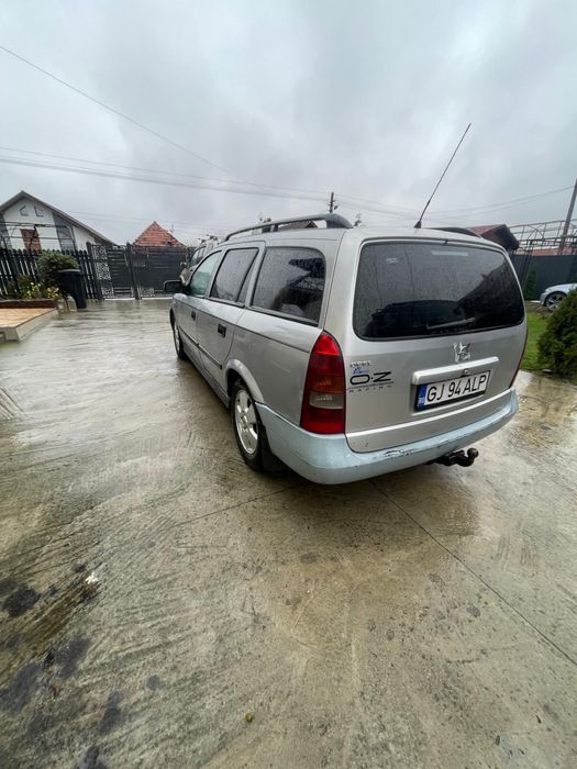 Vand masina opel astra g