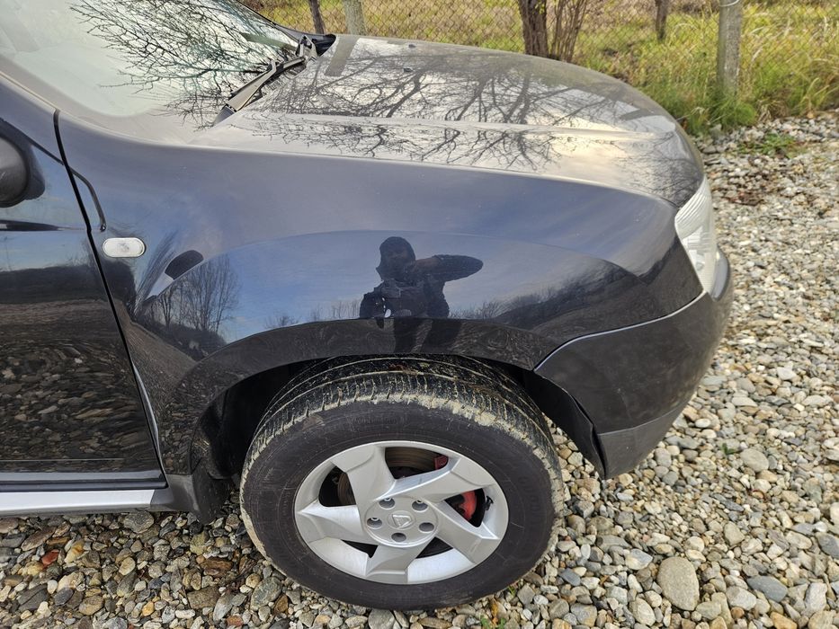 Aripa dreapta fata Dacia duster an 2013