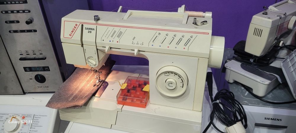 Mașina de cusut Singer