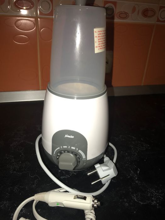 Încălzitor/sterilizator biberoane cu adaptor pt masina