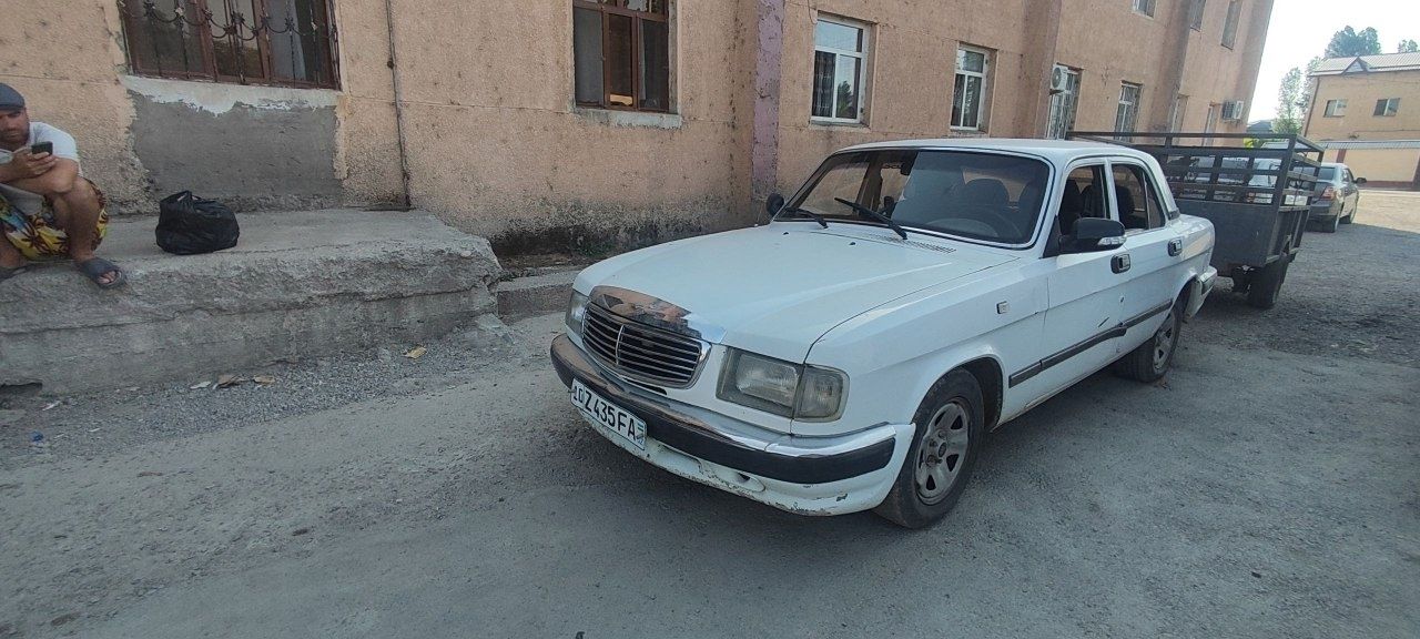 Продаю Волгу 3110 с прицепом