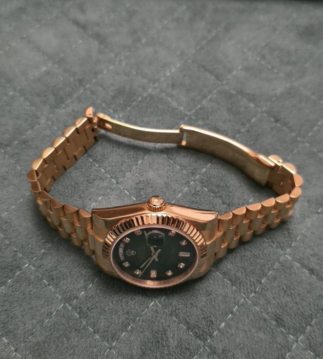 Rolex  day date gold lady