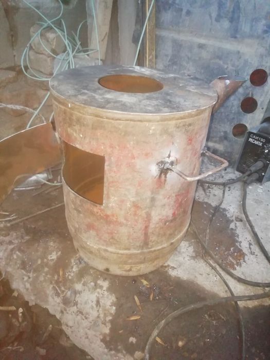 Очаг сделан из из маленького газ балона