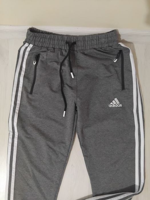 Pantaloni trening Nike și Adidas.