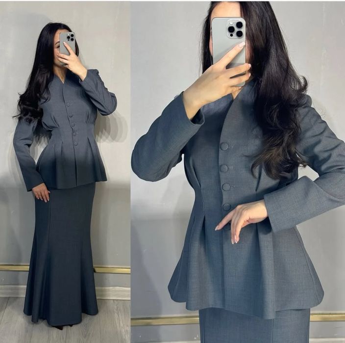 Срочно продам новый костюм двойка с юбкой