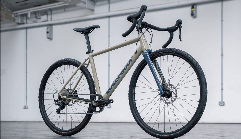 Bicicletă Nukeproof Digger Comp Alloy Gravel Bike in Cookie Dough